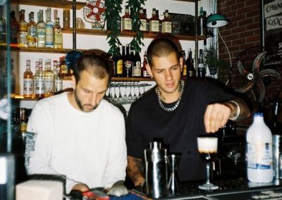Bar staff making cocktails
